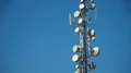 Communication tower antenna on blue background HD Footage