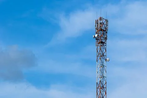 Communication tower on the background of the sky Stock Photos