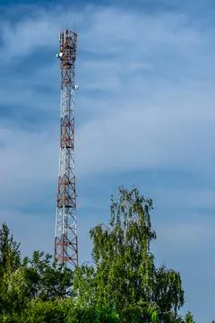 Communication tower on the background of the sky Stock Photos