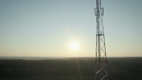 Communication tower on the background of the sky with the sunset. Stock Footage 169691142