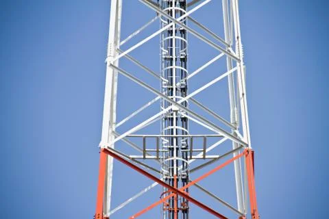 Communication Tower on blue sky background Stock Photos
