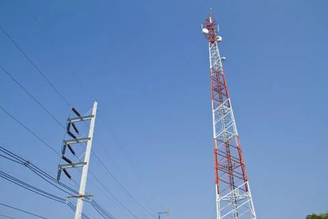 Communication Tower on blue sky background Stock Photos