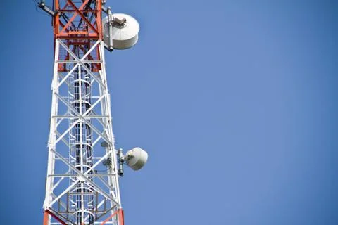 Communication Tower on blue sky background Stock Photos