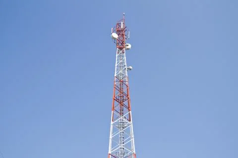 Communication Tower on blue sky background Stock Photos