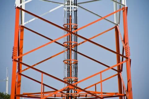 Communication Tower on blue sky background Stock Photos