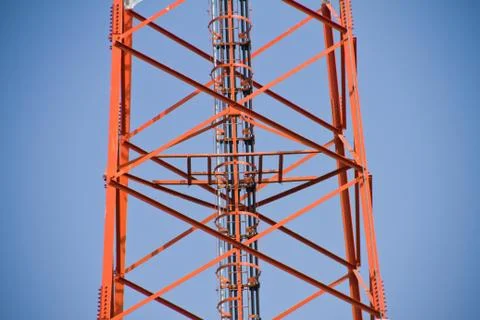 Communication Tower on blue sky background Stock Photos