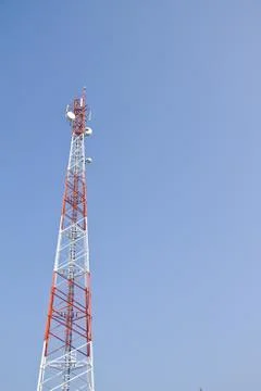 Communication Tower on blue sky background Stock Photos