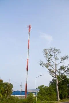 Communication Tower on blue sky background Stock Photos