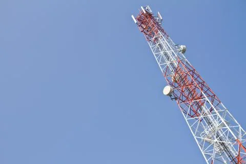 Communication Tower on blue sky background Stock Photos