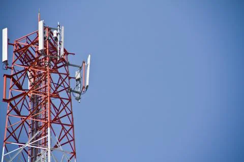 Communication Tower on blue sky background Stock Photos