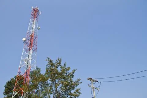 Communication Tower on blue sky background Stock Photos
