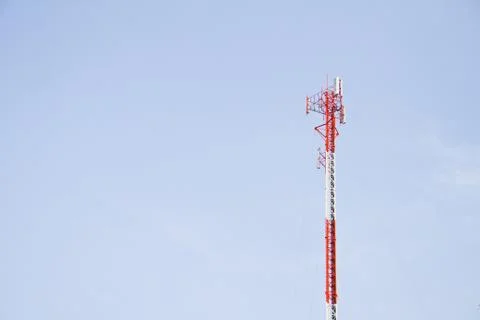 Communication Tower on blue sky background Stock Photos