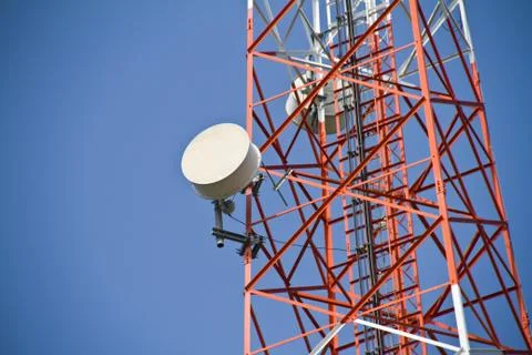 Communication Tower on blue sky background Stock Photos