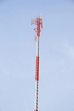 Communication Tower on blue sky background Stock Photos