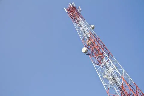 Communication Tower on blue sky background Stock Photos