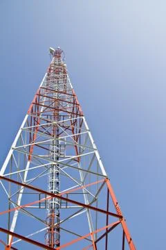 Communication Tower on blue sky background Stock Photos