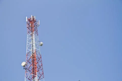 Communication Tower on blue sky background Stock Photos