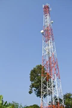 Communication Tower on blue sky background Stock Photos