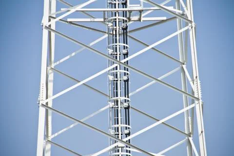 Communication Tower on blue sky background Stock Photos