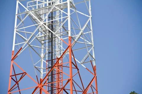 Communication Tower on blue sky background Stock Photos