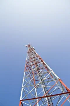 Communication Tower on blue sky background Stock Photos