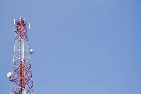 Communication Tower on blue sky background Stock Photos