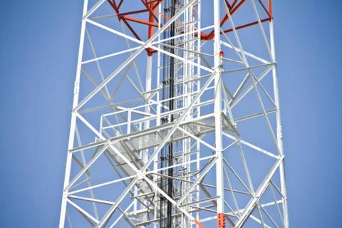 Communication Tower on blue sky background Stock Photos