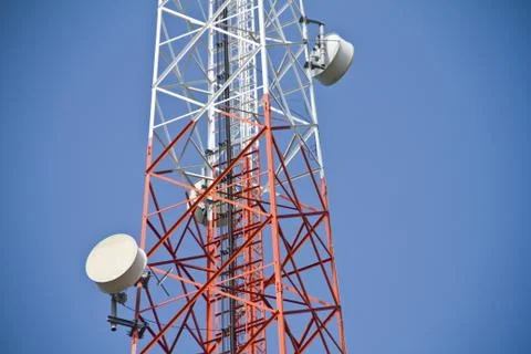 Communication Tower on blue sky background Stock Photos