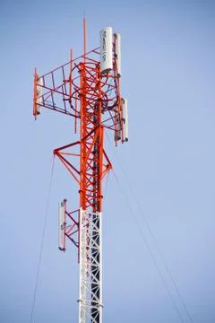 Communication Tower on blue sky background Stock Photos