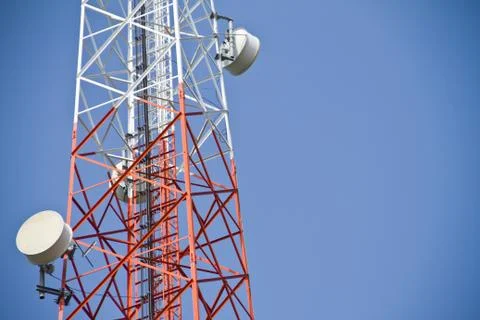 Communication Tower on blue sky background Stock Photos