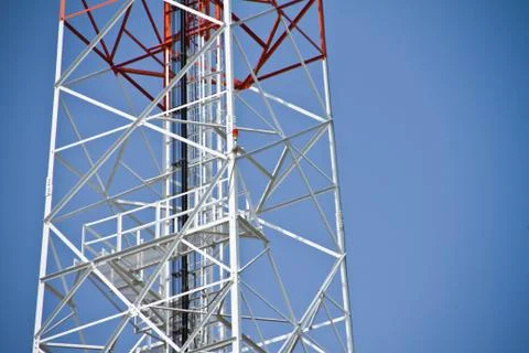 Communication Tower on blue sky background Stock Photos