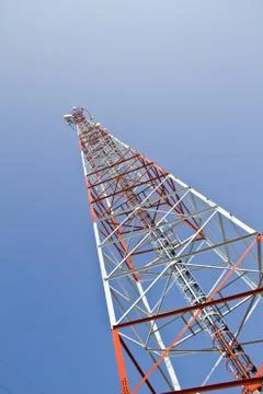 Communication Tower on blue sky background Stock Photos