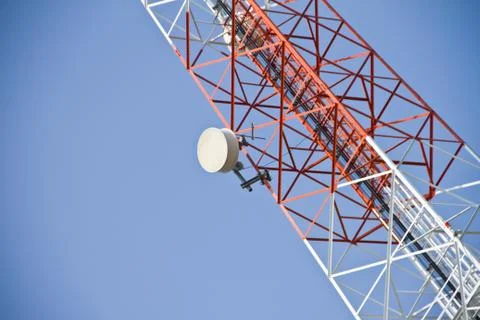 Communication Tower on blue sky background Stock Photos
