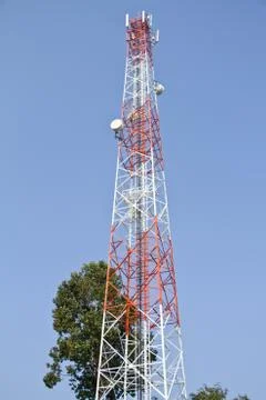 Communication Tower on blue sky background Stock Photos