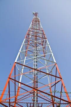 Communication Tower on blue sky background Stock Photos