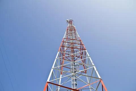 Communication Tower on blue sky background Stock Photos