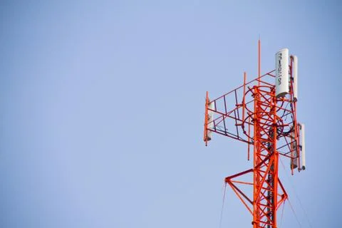 Communication Tower on blue sky background Stock Photos