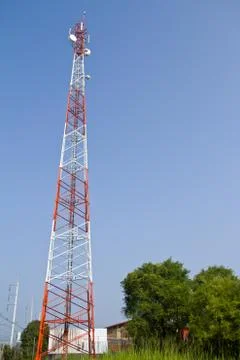 Communication Tower on blue sky background Stock Photos