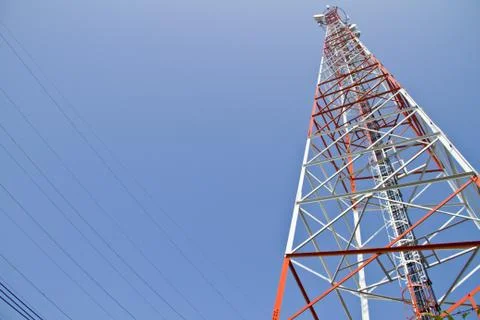 Communication Tower on blue sky background Stock Photos