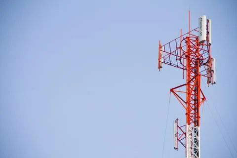Communication Tower on blue sky background Stock Photos