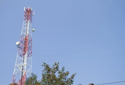 Communication Tower on blue sky background Stock Photos