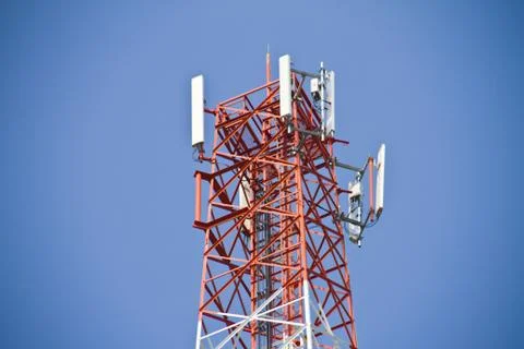 Communication Tower on blue sky background Stock Photos