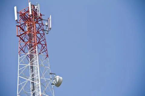 Communication Tower on blue sky background Stock Photos