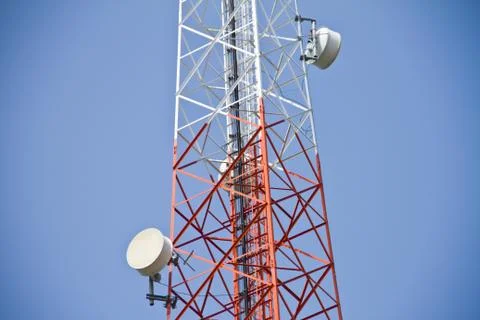 Communication Tower on blue sky background Stock Photos