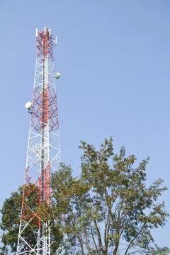 Communication Tower on blue sky background Stock Photos