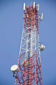 Communication Tower on blue sky background Stock Photos
