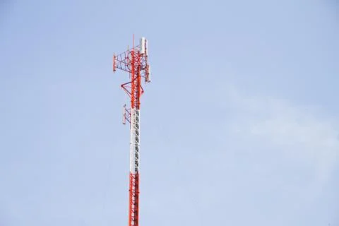 Communication Tower on blue sky background Stock Photos