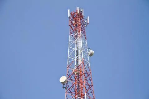Communication Tower on blue sky background Stock Photos