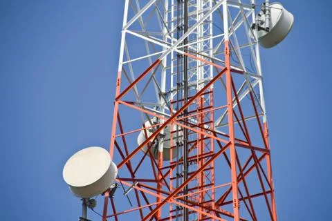 Communication Tower on blue sky background Stock Photos