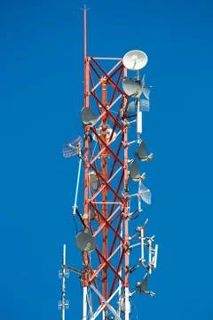 Communication Tower on blue sky background Stock Photos